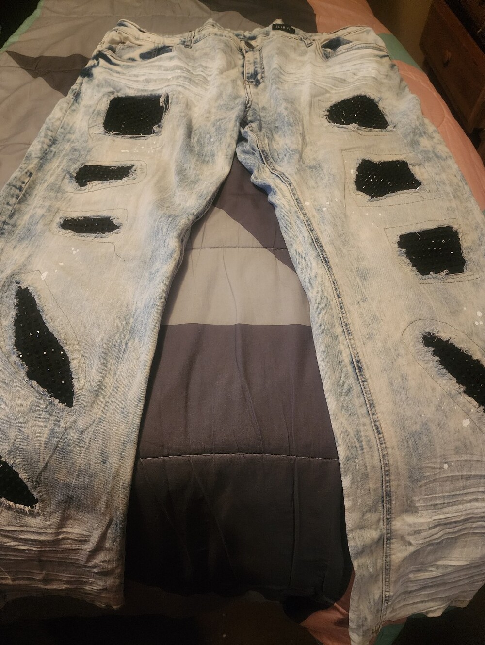 Light Acid-Wash Relaxed Men’s Jeans with Black Patch Accents